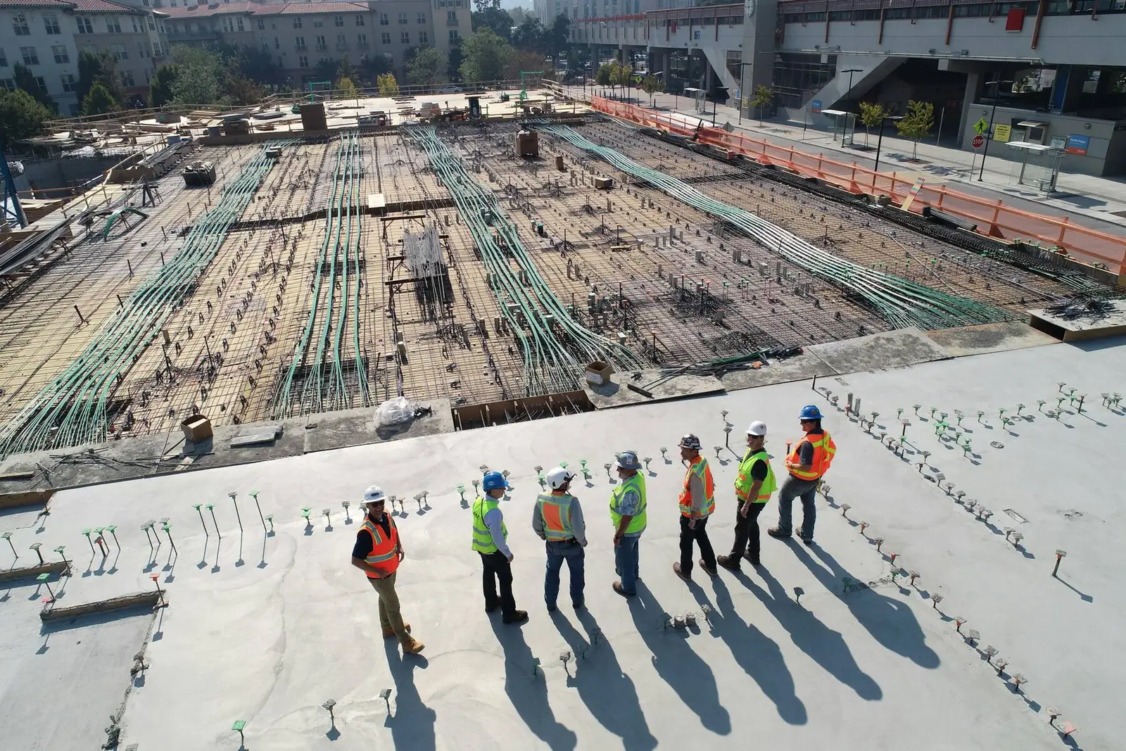 Construction site with workers and equipment